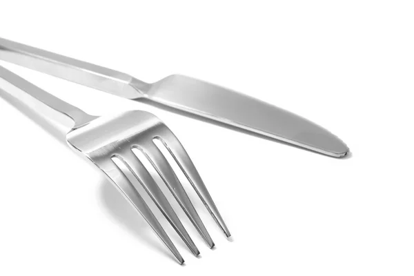 Tenedor y cuchillo en una servilleta —  Fotos de Stock