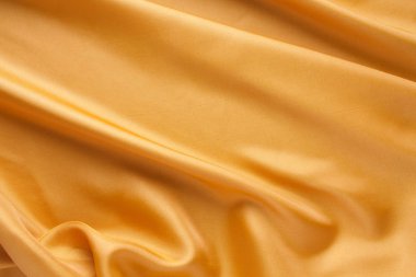 Altın kumaş dokusu arka plan