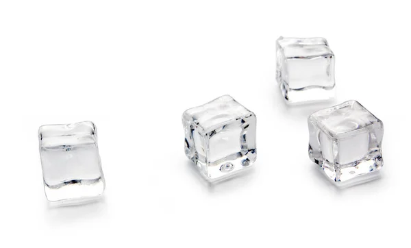 Três cubos de gelo em branco — Fotografia de Stock