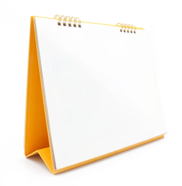 Κίτρινο επιτραπέζιο ημερολόγιο, απομονώνονται σε λευκό — Φωτογραφία Αρχείου