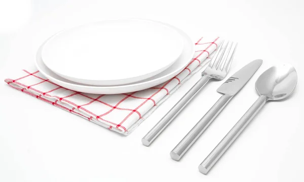 Gaffel och kniv på vit servett在白色餐巾纸上的刀和叉 — Stockfoto
