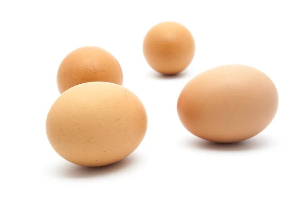 Quattro uova isolate su bianco — Foto Stock
