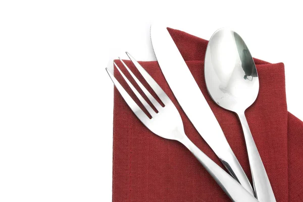 Gabel und Messer auf roter Serviette isoliert — Stockfoto