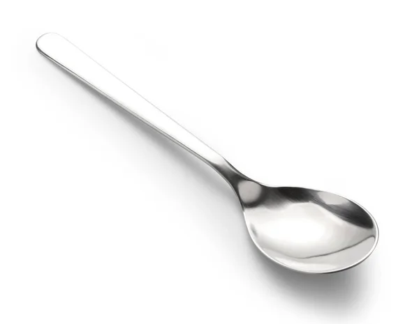 Gümüş kaşık üzerine beyaz izole