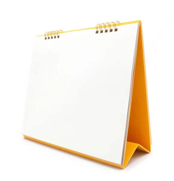 Žlutá stolní kalendář, izolované na bílém — Stock fotografie