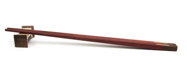 Wooden chopsticks on white — Stock Photo, Image