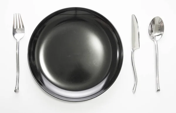 Placera inställningen med plattan kniv gaffel och sked — Stockfoto