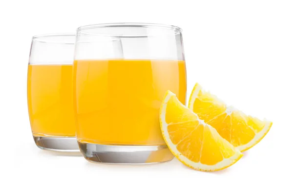 Vackra frukt dricka glas apelsinjuice och skivor orange — Stockfoto