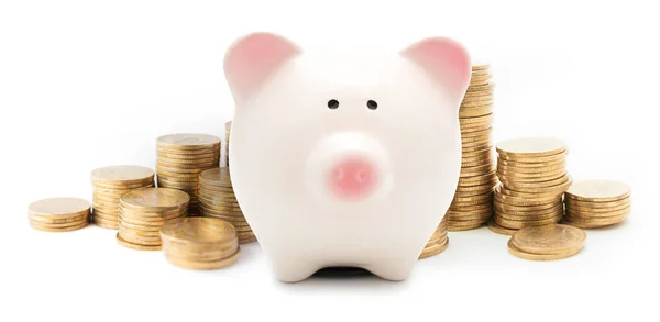 Piggy bank en munten geïsoleerd — Stockfoto