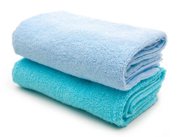 Mavi havlu üzerinde beyaz izole 