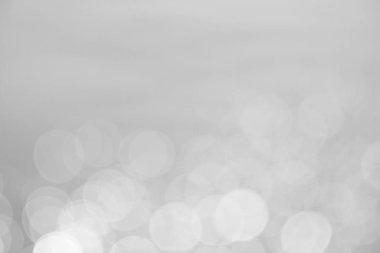 Gümüş ve beyaz bokeh ışıklar arka plan