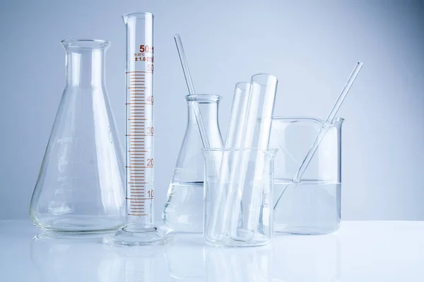 Laboratory glassware on table, Symbolic of science research. — Stock Photo, Image