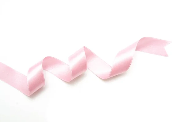 Arco de cinta rosa aislado en blanco — Foto de Stock