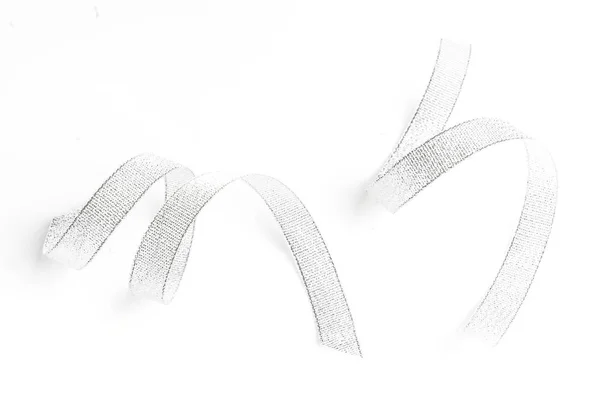 Zilver lint strik op wit geïsoleerd — Stockfoto
