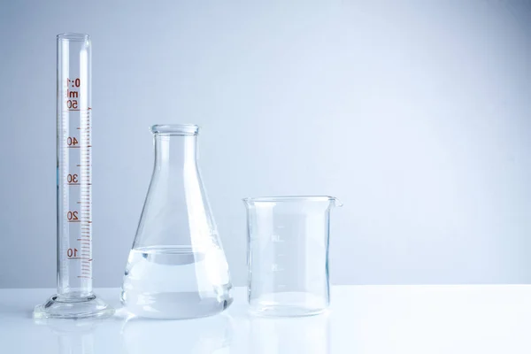 Laboratory glassware on table, Symbolic of science research. — Stock Photo, Image