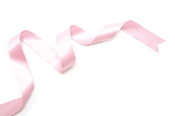 Розовый бант ленты в изолированных на белом — стоковое фото