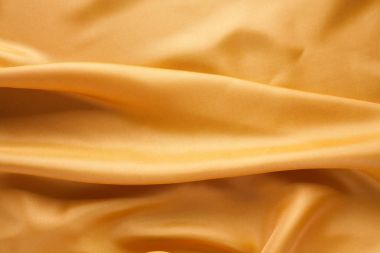 Altın kumaş dokusu arka plan