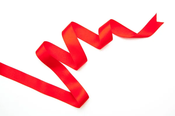 Borda de fita vermelha isolada em branco — Fotografia de Stock
