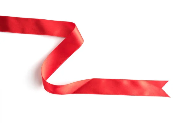 Red bow ribbon satin texture isolated on white — Stock Photo, Image