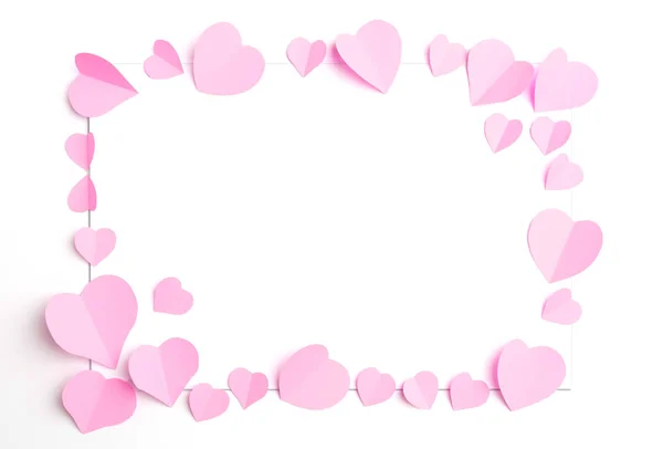 Růžové papírové srdce izolované na bílém — Stock fotografie