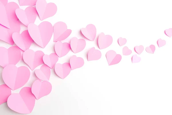 Coeurs en papier rose isolés sur blanc — Photo