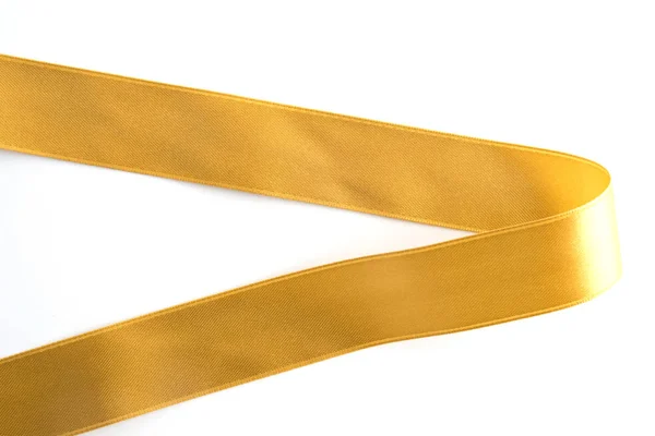 Gold bow ribbon satin texture isolated on white — Stock Photo, Image