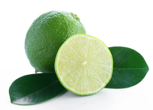 Lime fruit with a half isolated on white — Stock Photo, Image