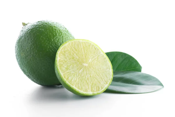 Lime fruit with a half isolated on white — Stock Photo, Image