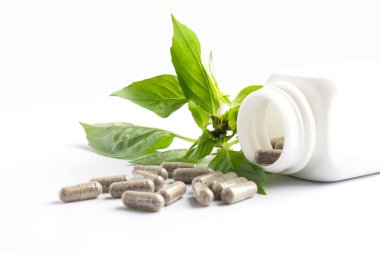 izole şişeden dökülmesini ot kapsül