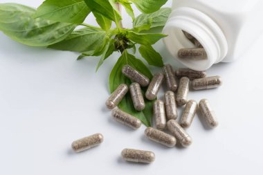 izole şişeden dökülmesini ot kapsül