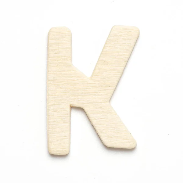 K tahta yazı tipi harfi izole et — Stok fotoğraf