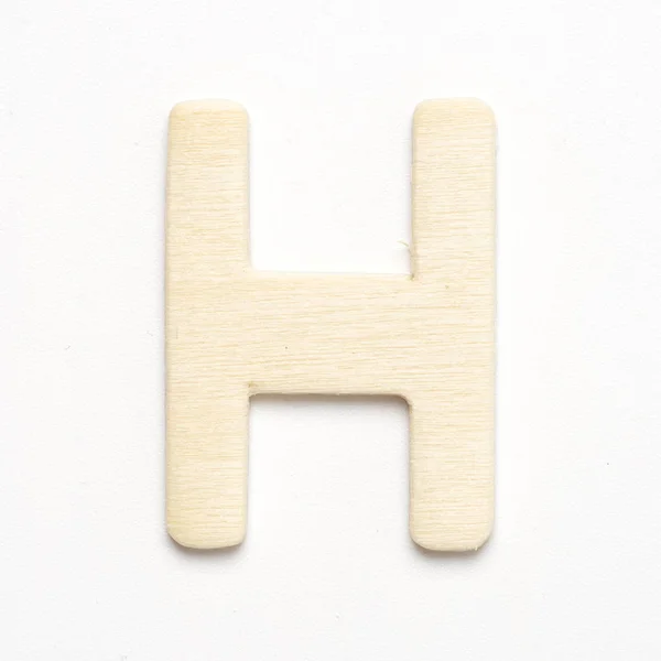 H wooden lettertype letter isolate — Stockfoto