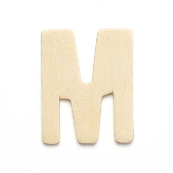 M wooden lettertype letter isolate — Stockfoto