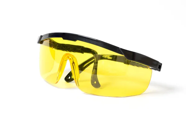 Black plastic protective work glasses — Stock Photo, Image