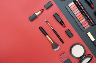 set decorative cosmetics on black and red