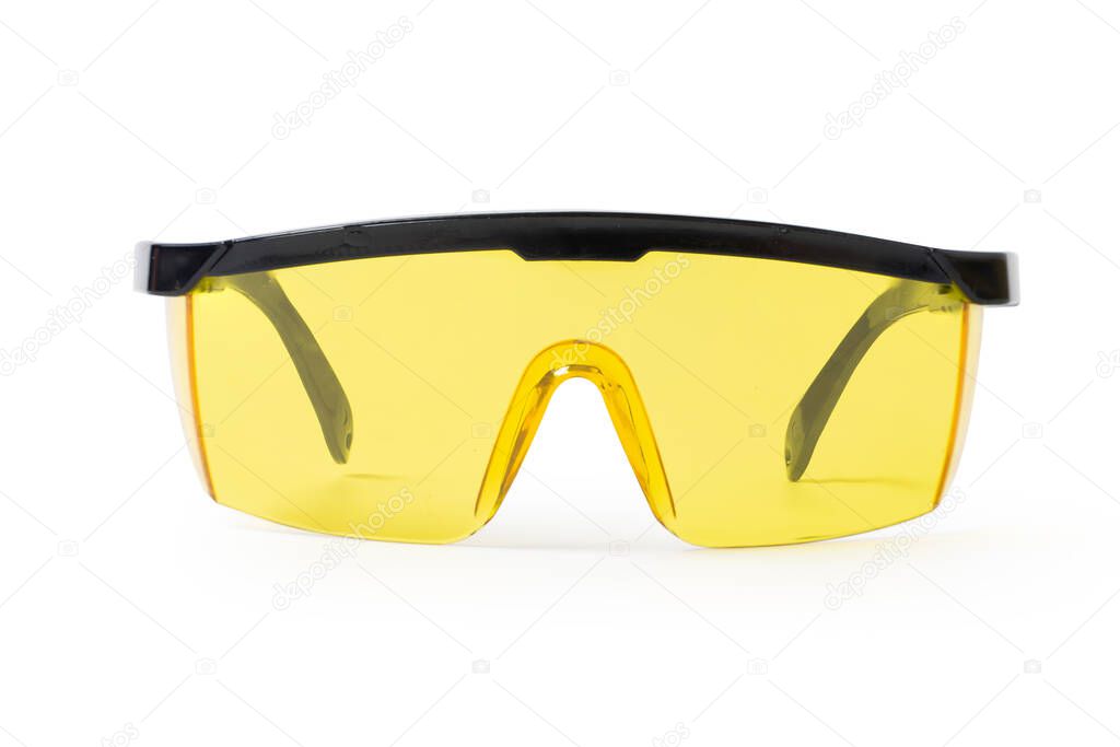 black plastic protective work glasses on white background