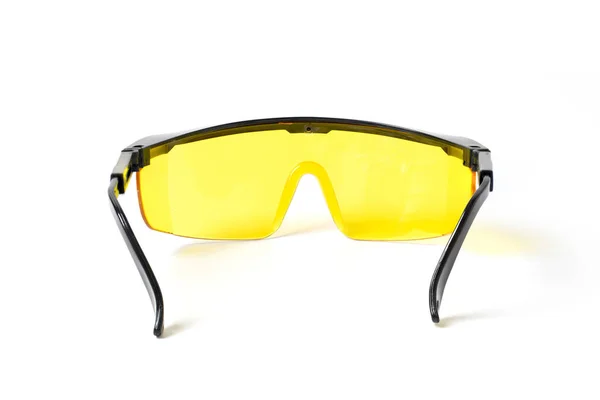 白い背景に黒いプラスチック製の保護作業用眼鏡 — ストック写真