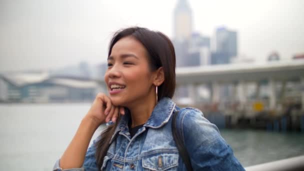 Attractive Young Asian Woman Speaks to Friend by the Pier Closeup 4k — Stock Video