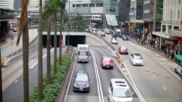 Busy Road in Hong Kong with Cars, Buses and Taxis Driving Fast, Daytime 4k — Stock Video