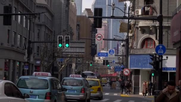 Traffic Light in Shanghai turns Green Taxis Start Driving 4k — Stock Video