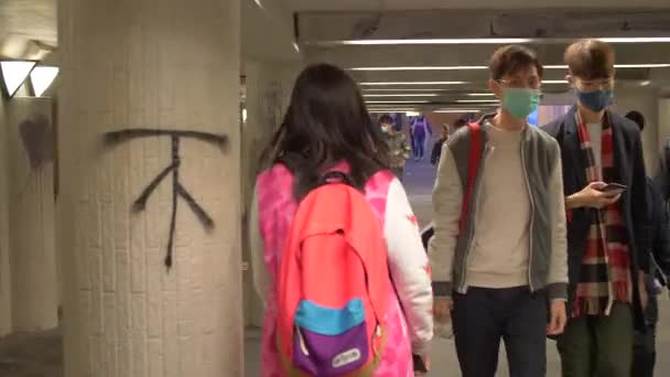 Hong Kong People Walk through crowded underground pathway 4k — 비디오