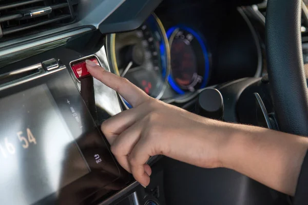 Business woman push emergency button in car, close up. — Stock Photo, Image