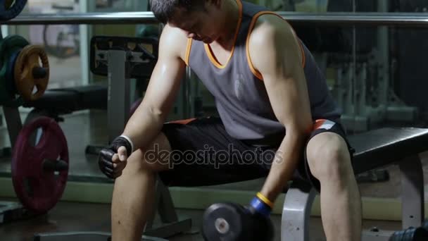 Fitness and lifestyle concept,Muscular man working out with dumbbells — Stock Video