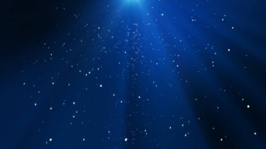 Gelen sualtı kabarcıkları ile mavi okyanus dalgaları. Işık ışınları s