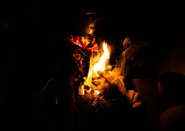 Asian way of cooking at fireplace — Stock Photo, Image