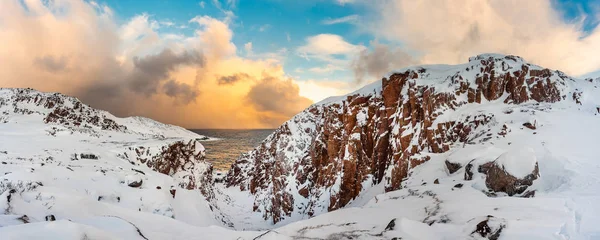 The Red Rocks of Teriberka. Large panorama (over 9 500 by 3 500 pixel) of an iconic view in Russia\'s Kola Peninsula, near Murmansk, above the Arctic Circle