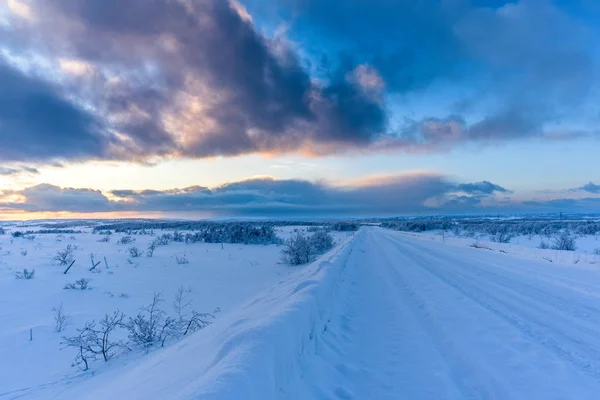 Winter Road Covered Snow Tire Tracks Sunset — 스톡 사진