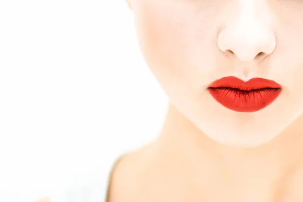 Primer plano. Mujer con labios rojos sobre un fondo claro —  Fotos de Stock