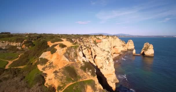 Aerial, Caves At Farol Da Ponta Da Piedade, Lagos, Portugal — Vídeo de Stock