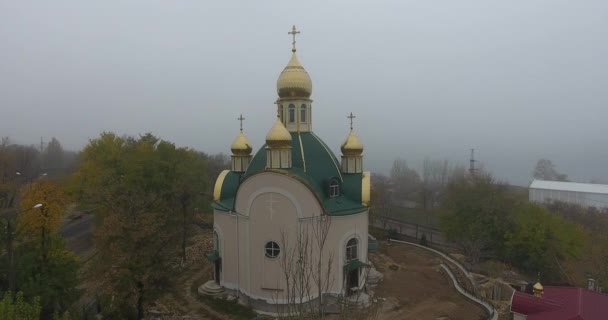 Aerial view Holy Great Martyr Catherine, city of Mukolayev in dense fog, Ukraine — Stock Video